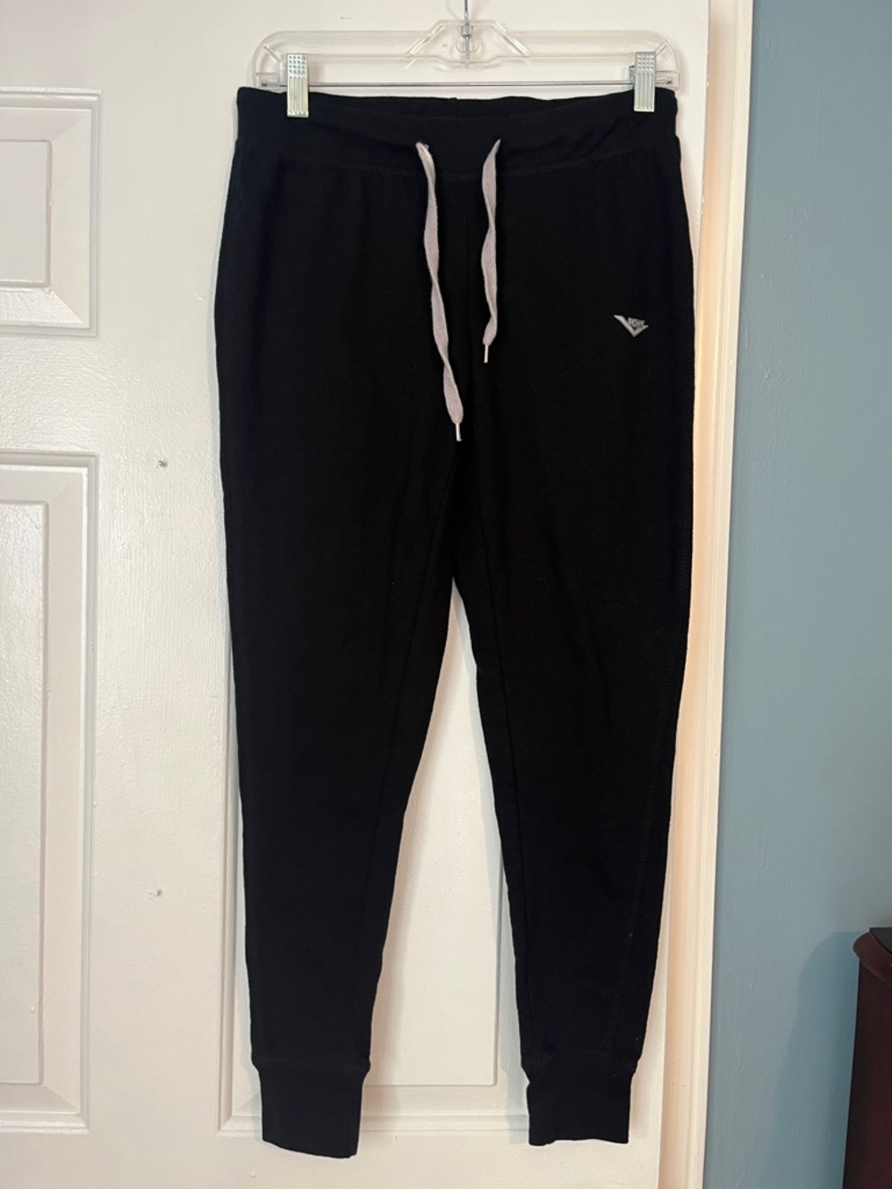 Pony Black Sweatshirt with Red and Blue Logo Tag